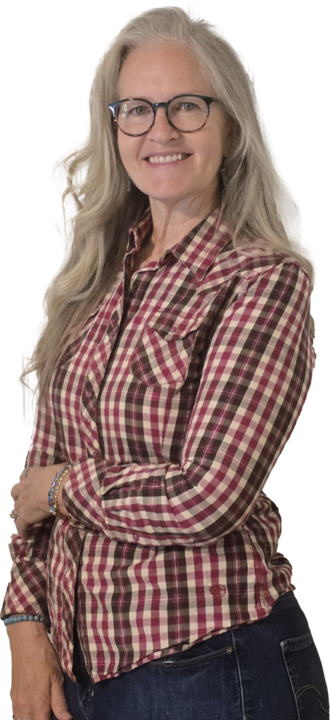 Stacey, owner of Sew & Saw Studio in Dandridge, Tennessee, wearing her plaid shirt.