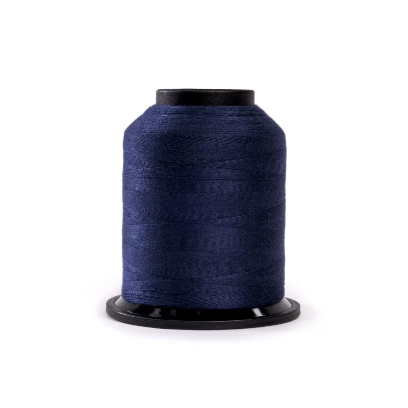 Grace Finesse 50 wt Polyester Thread – Midnight Blue – Deep navy blue quilting thread on a 1,100-yard mini cone