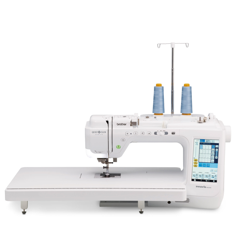 Brother Innov-is BQ2500 sewing and quilting machine with wide table and dual thread spools.